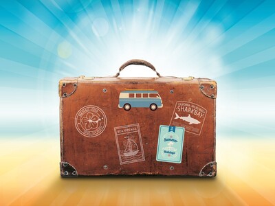 Für den Urlaub Koffer packen
