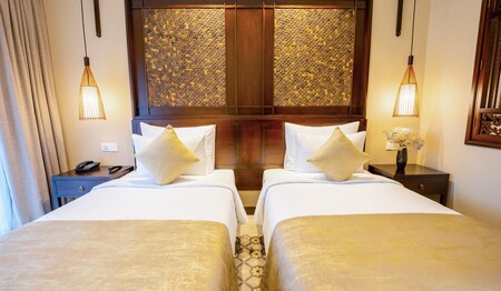 Einladendes Zimmer des Ahoy Boutique Resort & Spa in Hoi An: Singles & Alleinreisende buchen bei singlereisen.de